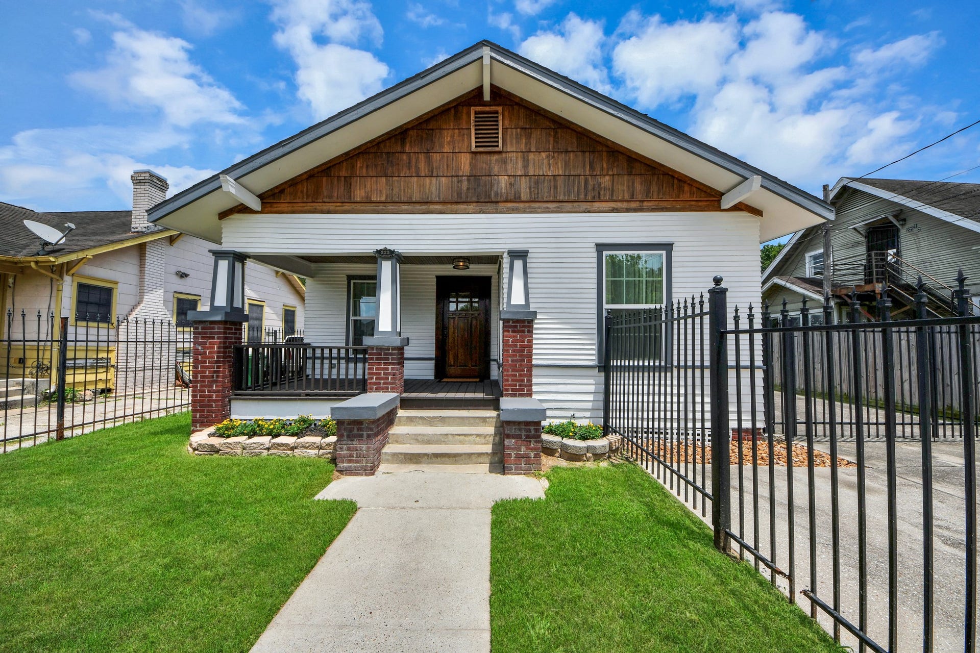 Welcome to 225 Lenox St where a welcoming front porch and timeless curb appeal set the tone from the moment you arrive.
