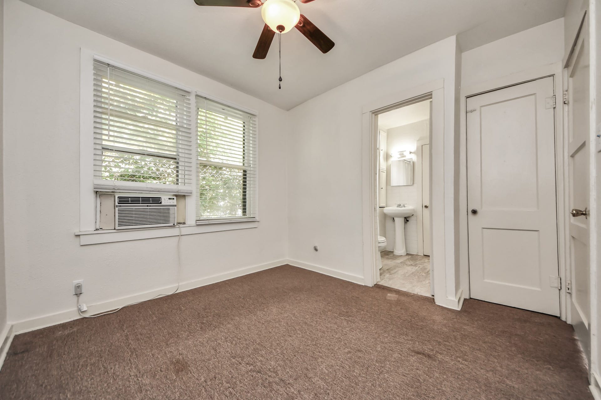 A second well-appointed bedroom also enjoys direct access to the shared Jack-and-Jill bathroom.