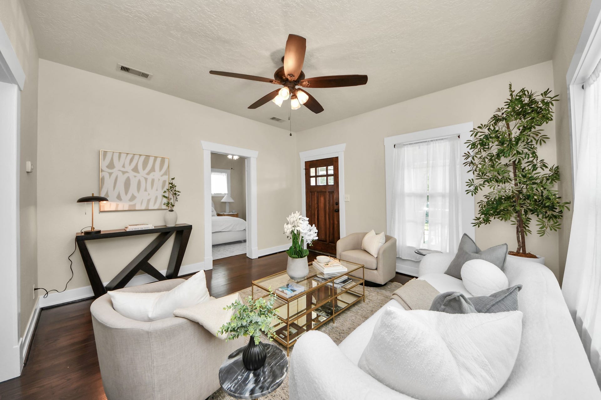 Designed for both comfort and connection, the spacious living room offers the perfect setting for relaxing or gathering with family and friends.