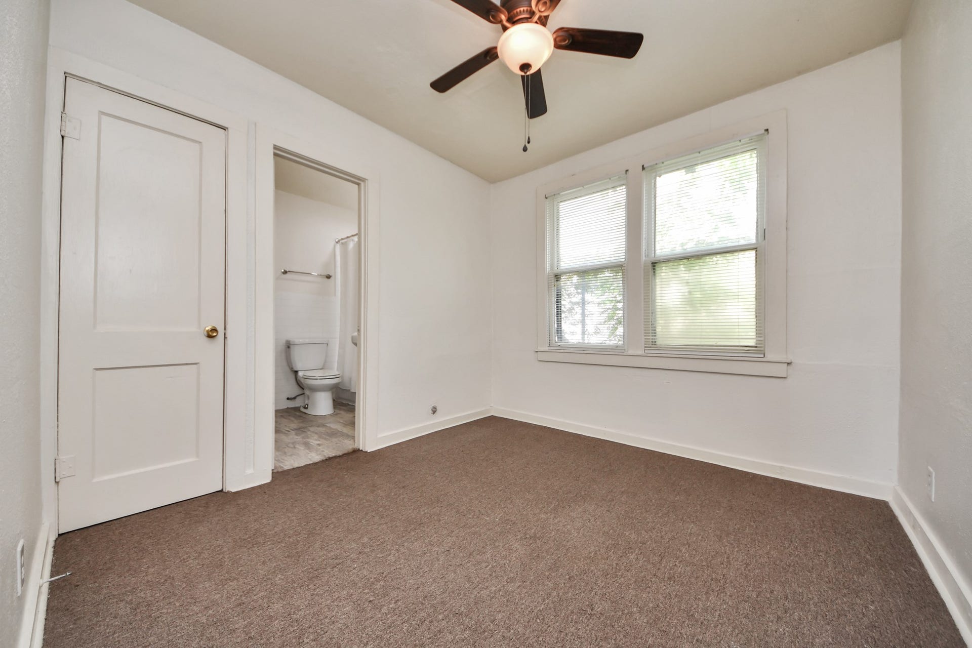 Spacious bedroom with direct access to the shared Jack-and-Jill bathroom.