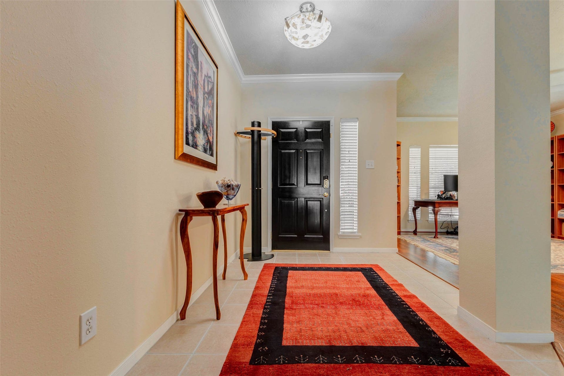 There's a storm door on the other side of the front door - you can leave the front door open for more natural light
