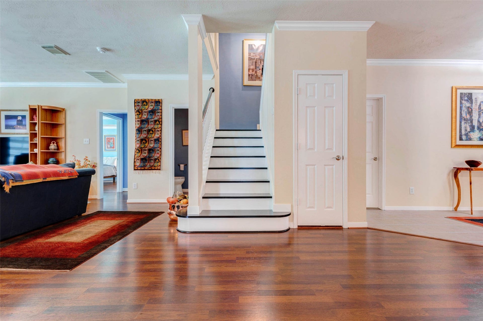 Updated and painted stairs to add a modern touch to the home.