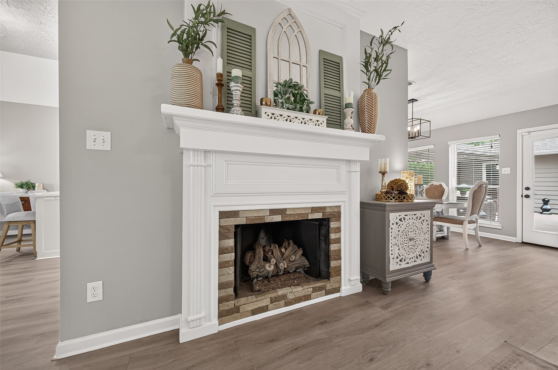 1411 Bittersweet Court, Richmond, TX 77406 Cozy Fireplace takes center stage in family room