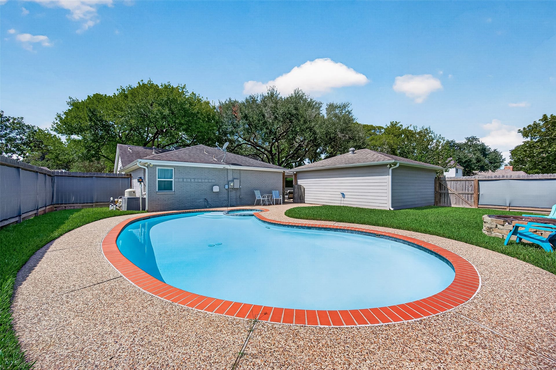 1411 Bittersweet Court, Richmond, TX 77406 Huge Pool and an abundance of yard space and landscaping.