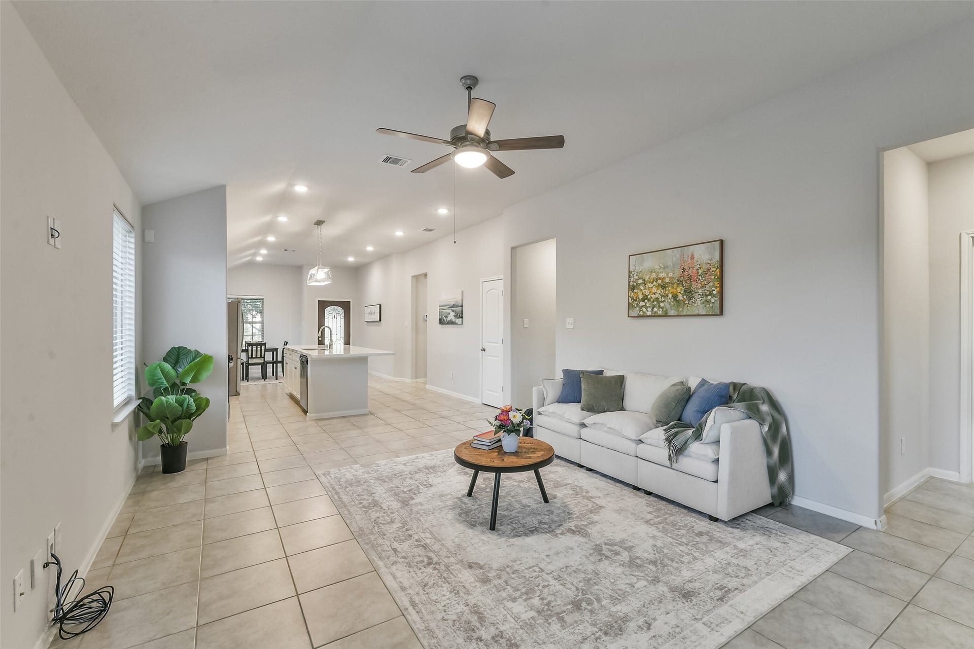 19450 Tobiano Park Drive, Tomball, TX 77377 Activities can move seamlessly from one area to the next in this open floor plan.