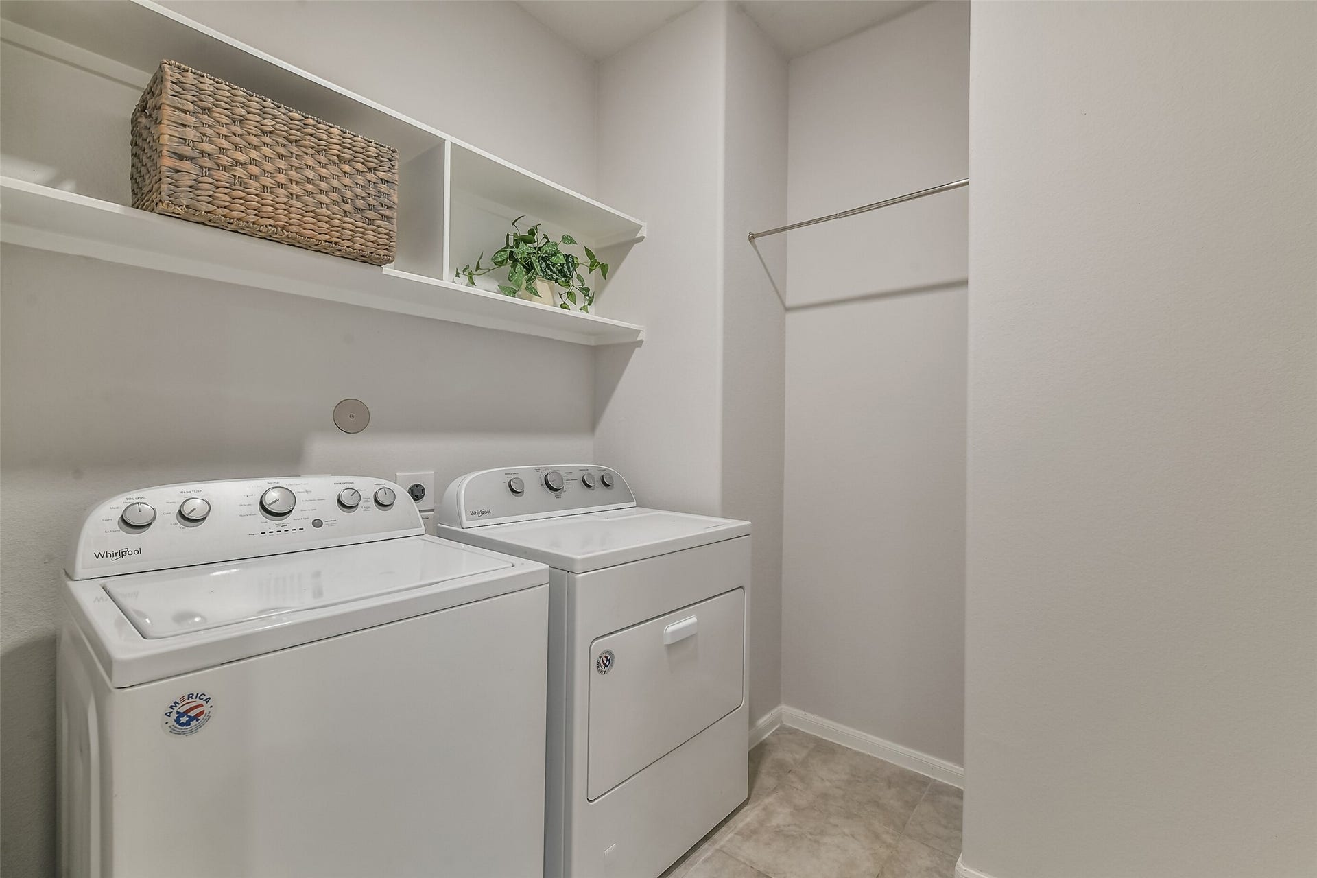 19450 Tobiano Park Drive, Tomball, TX 77377 This laundry room has plenty of space for a full washer and dryer.