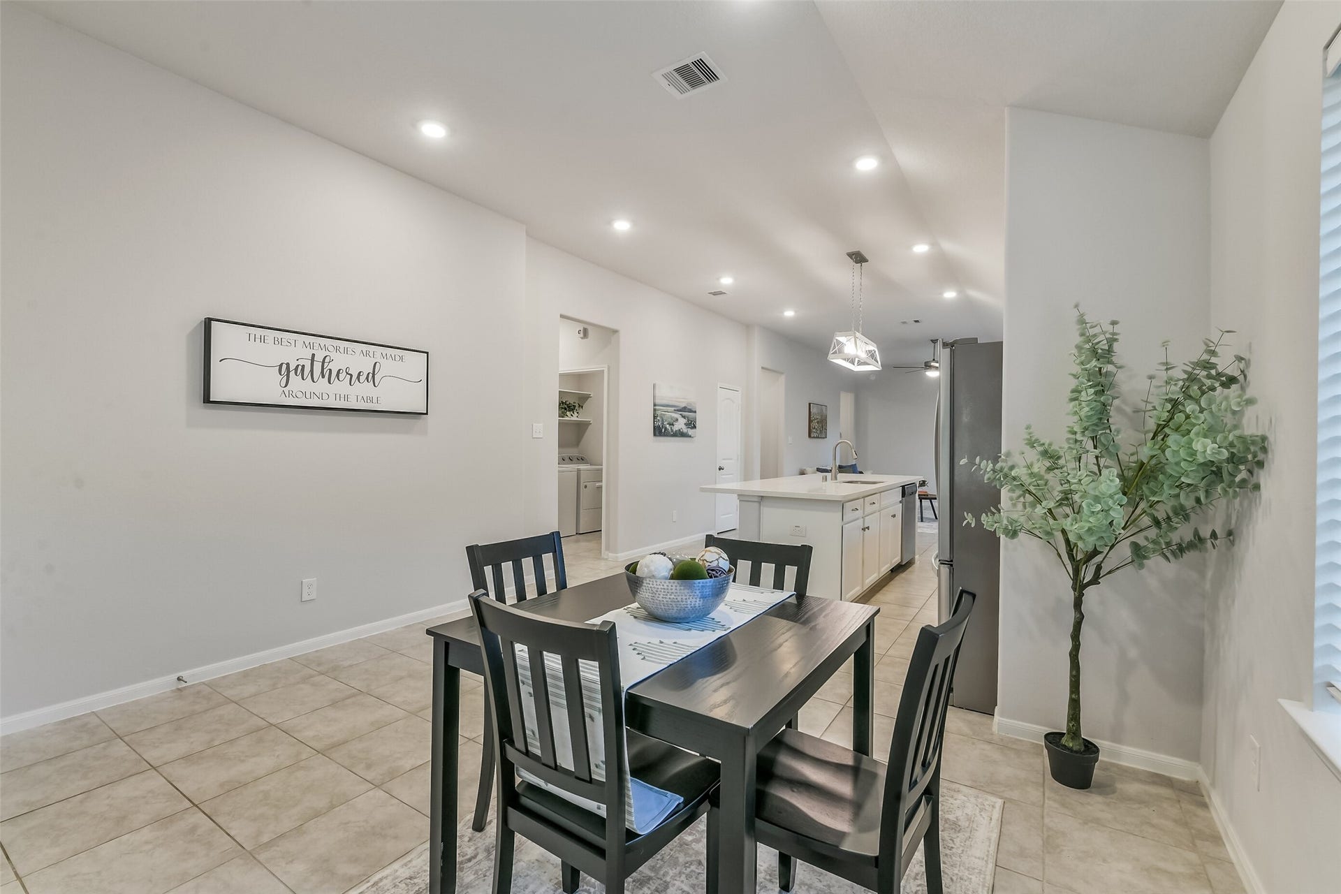 19450 Tobiano Park Drive, Tomball, TX 77377 The dining area flows nicely into the kitchen, where the cook doesn't feel left out of the action.