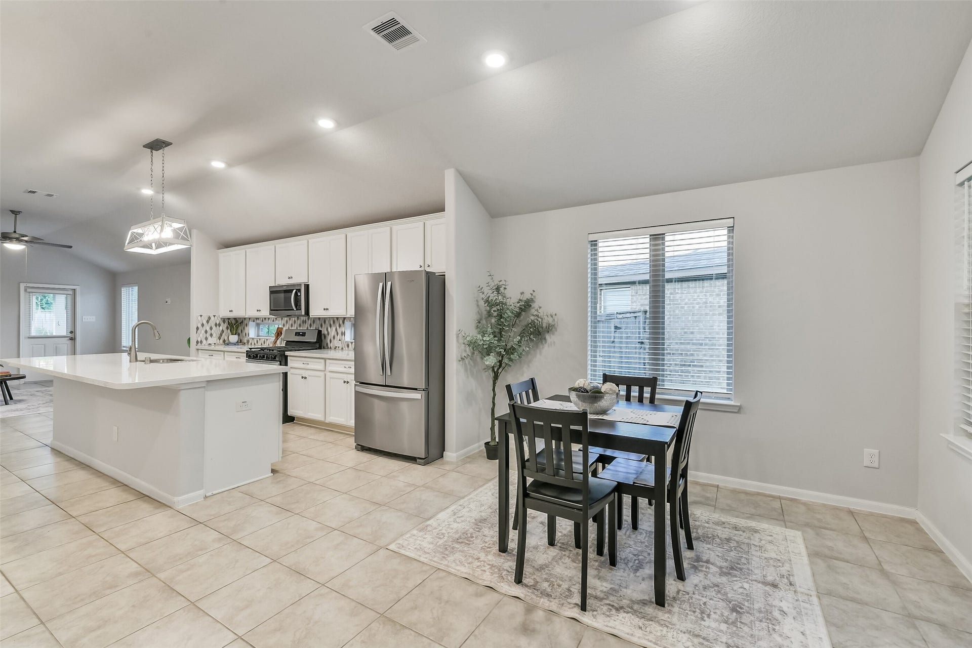 19450 Tobiano Park Drive, Tomball, TX 77377 These spaces are defined but still all flow together.