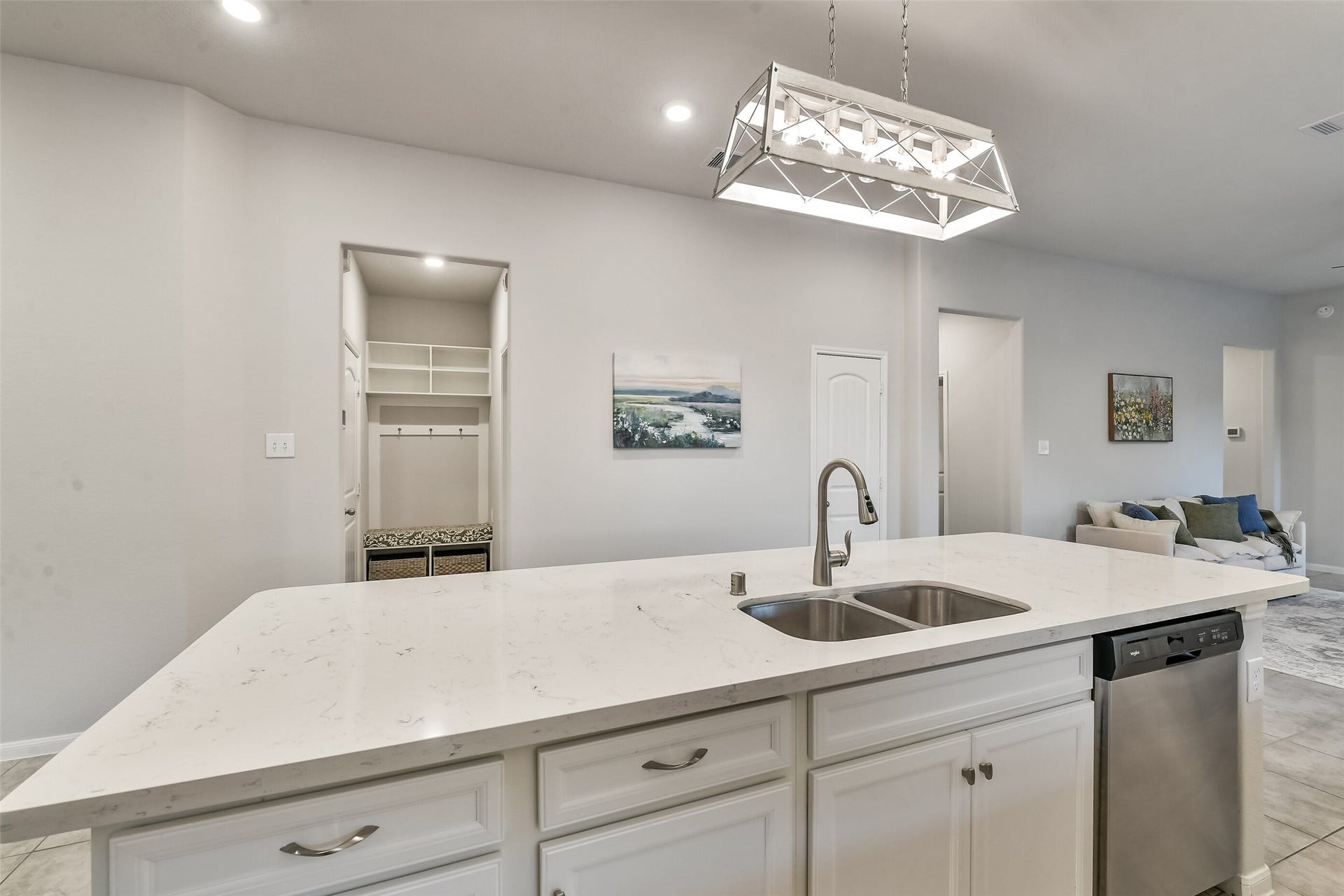 19450 Tobiano Park Drive, Tomball, TX 77377 Custom lighting adds beauty to this quartz island.