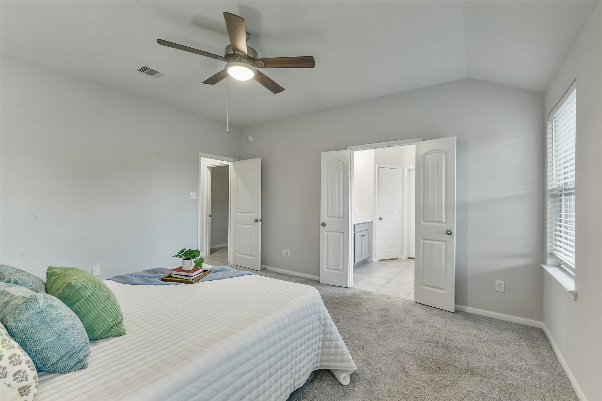 19450 Tobiano Park Drive, Tomball, TX 77377 This generous primary bedroom opens to a large ensuite bath.