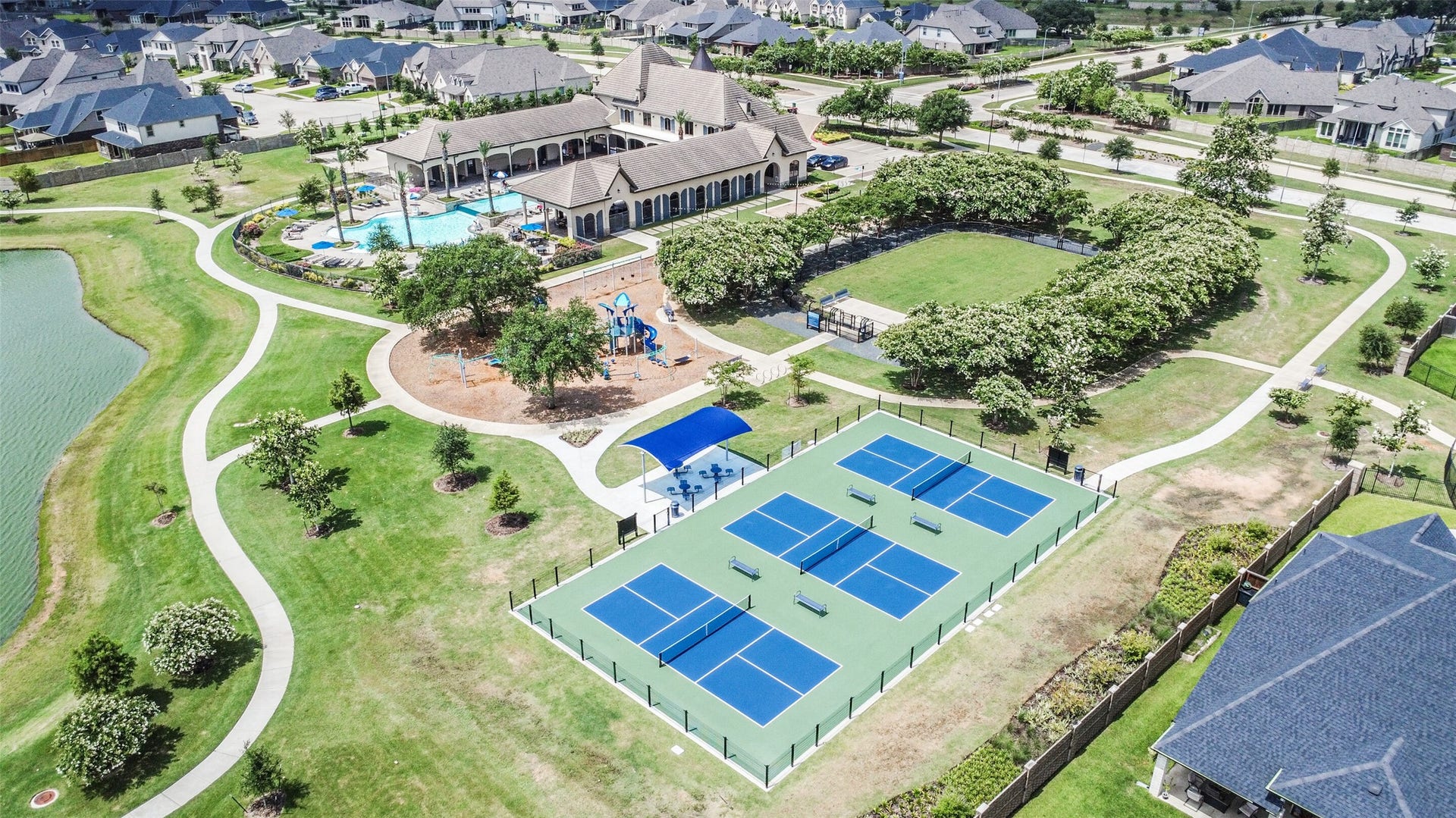 19450 Tobiano Park Drive, Tomball, TX 77377 Playground, walking trails, and pickleball courts all conveniently located in the neighborhood.