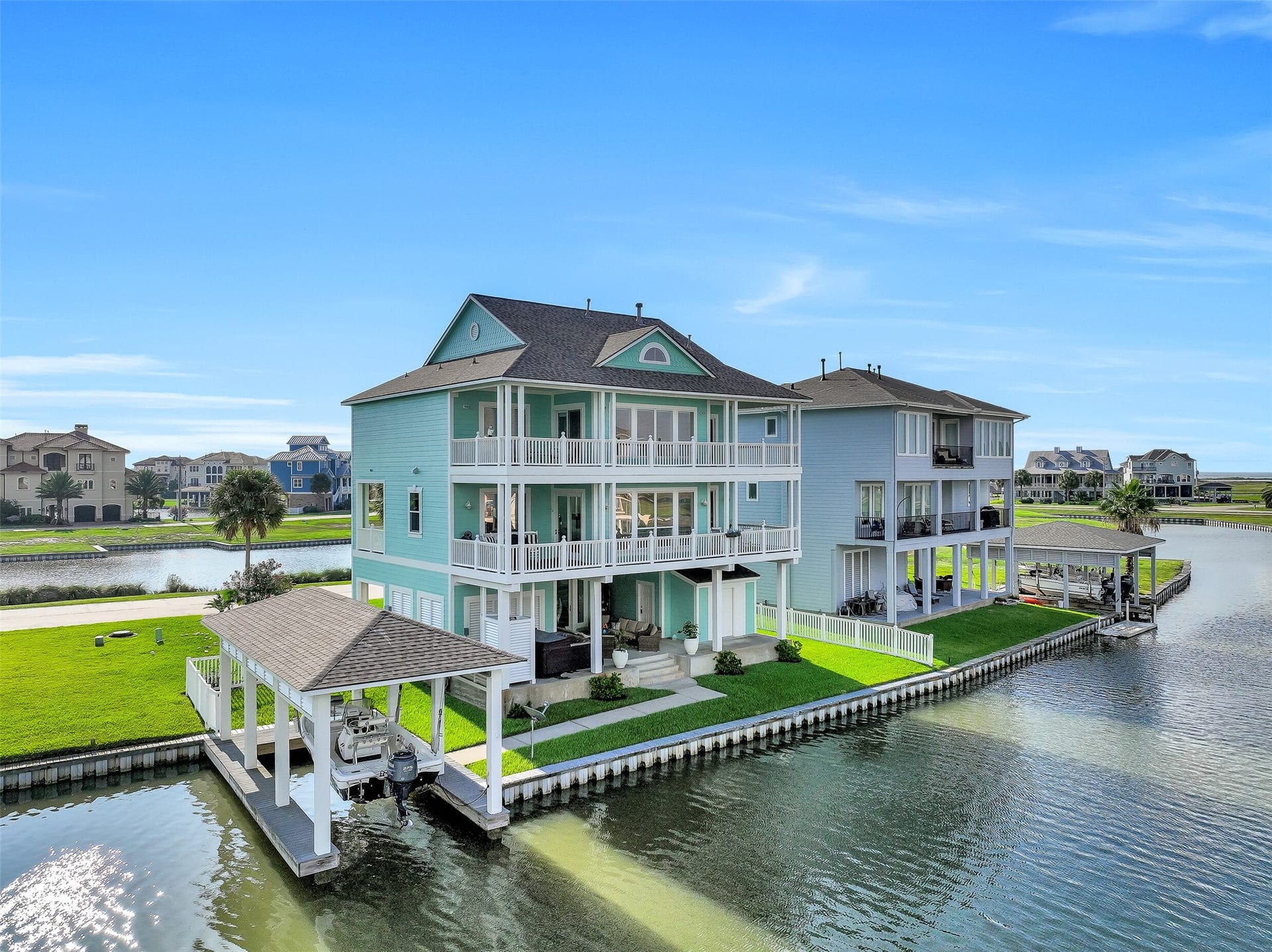 12 Fleming, Hitchcock, TX 77563 Your boat has never had it this good. The private boathouse at 12 Fleming features a 30-foot electric lift, fully rebuilt dock with treated lumber and stainless steel hardware, and direct canal access to the Intracoastal Waterway and Galveston Bay beyond. Pull in, tie up, and be on the water in minutes. The Flamingo Isles MUD maintains the bulkheads and canal depths so the infrastructure that matters most is taken care of. This is the boathouse serious boaters have been looking fo