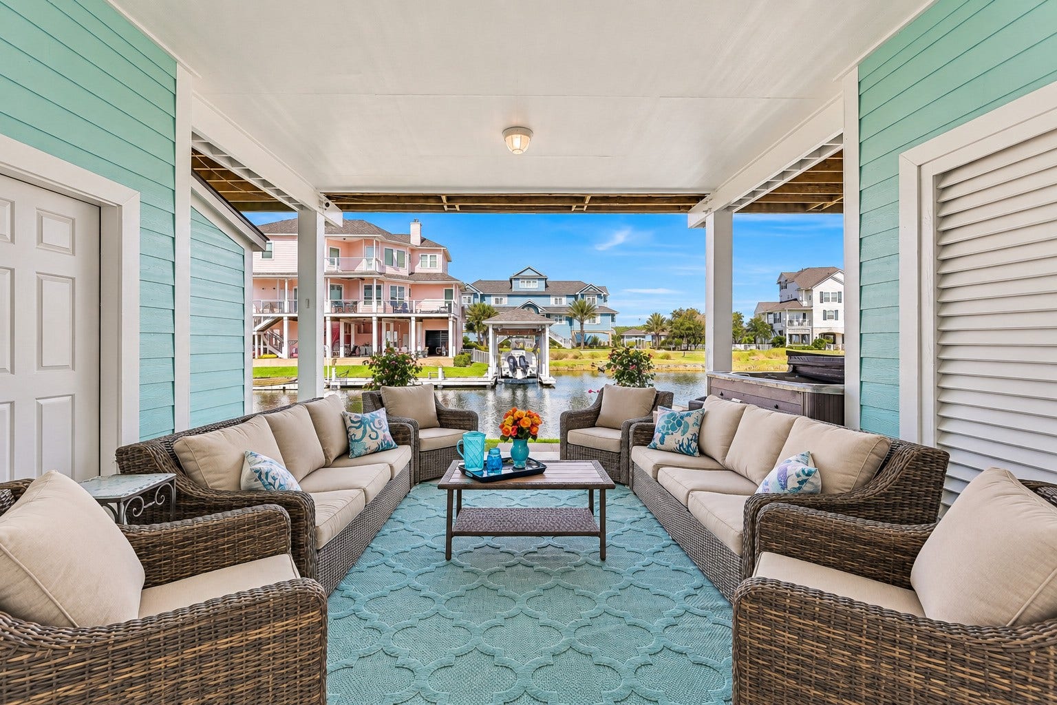 12 Fleming, Hitchcock, TX 77563 An expansive covered dockside patio, outdoor shower, and Sunbelt 8-person hot tub designed for the way people actually live on the water. Watch the boats go by. Listen to the fish jump. Stay a while.
