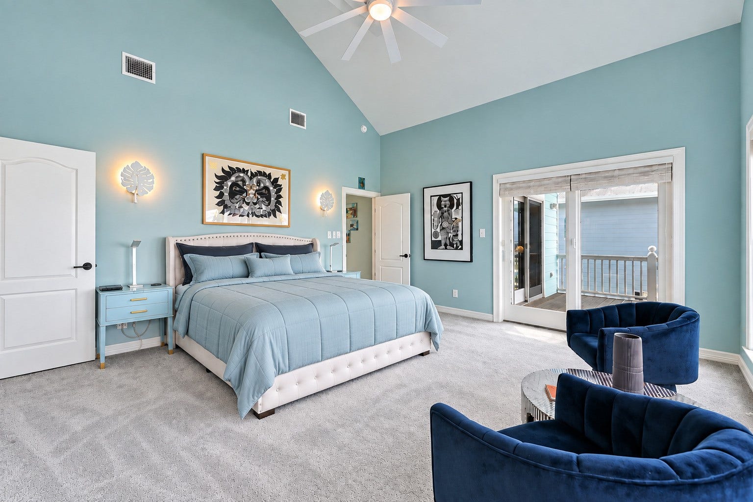 12 Fleming, Hitchcock, TX 77563 The primary suite at 12 Fleming is exactly what a waterfront luxury home should offer a private sanctuary above it all. Spacious enough for the largest furnishings, dressed in updated plush Shaw carpet, designer paint, and fresh custom finishes throughout, with dual balcony access that brings the water views right into the room. Wake up to the canal every morning. This is the suite you have been looking for.