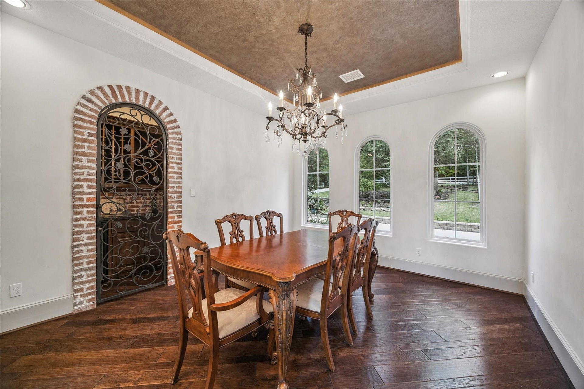 Formal dining room off of kitchen with wine cellar storage