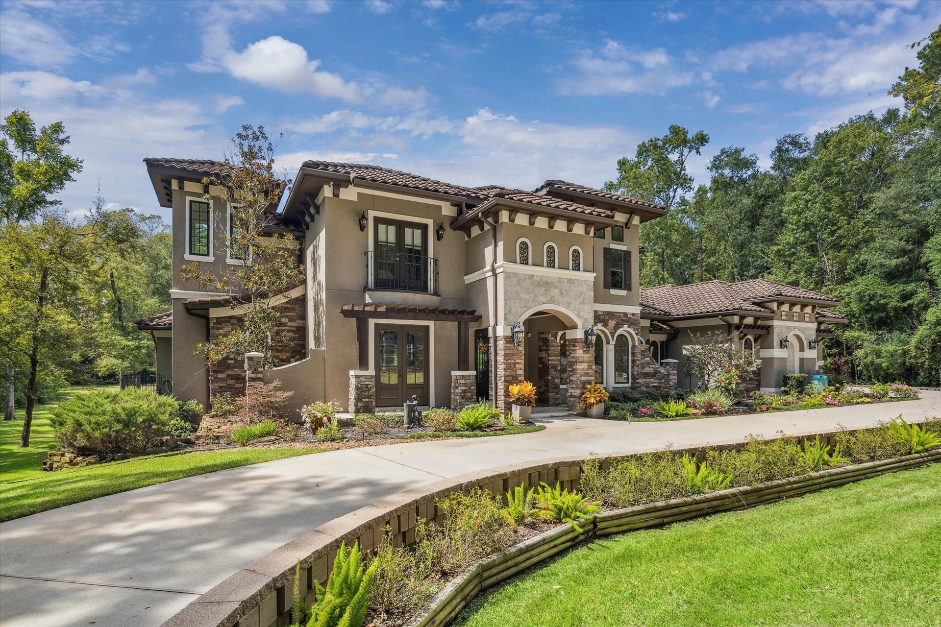 Gorgeous curb appeal and a circular driveway for abundant parking