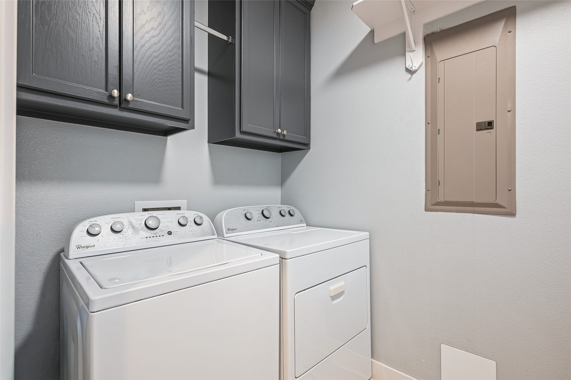 Utility room with washer and dryer