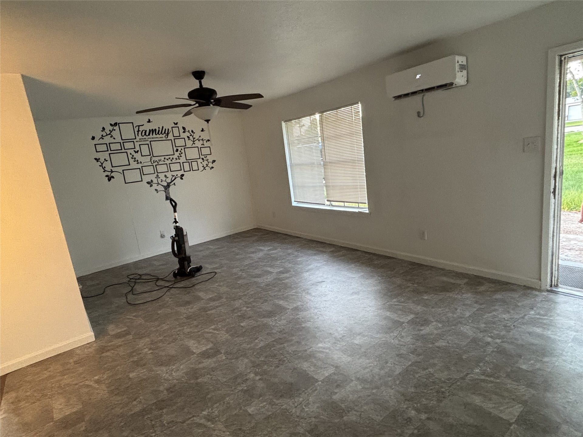 11831 Fm 1764 Road, Santa Fe, TX 77510 Living room with updated flooring.