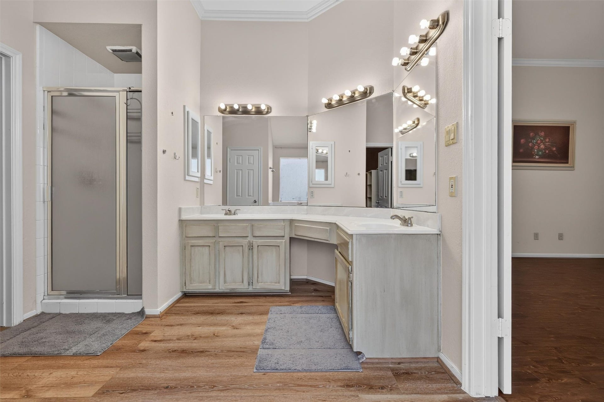 1306 N Gabriel River Circle, Sugar Land, TX 77478 Double vanity and cabinets with a rustic finish