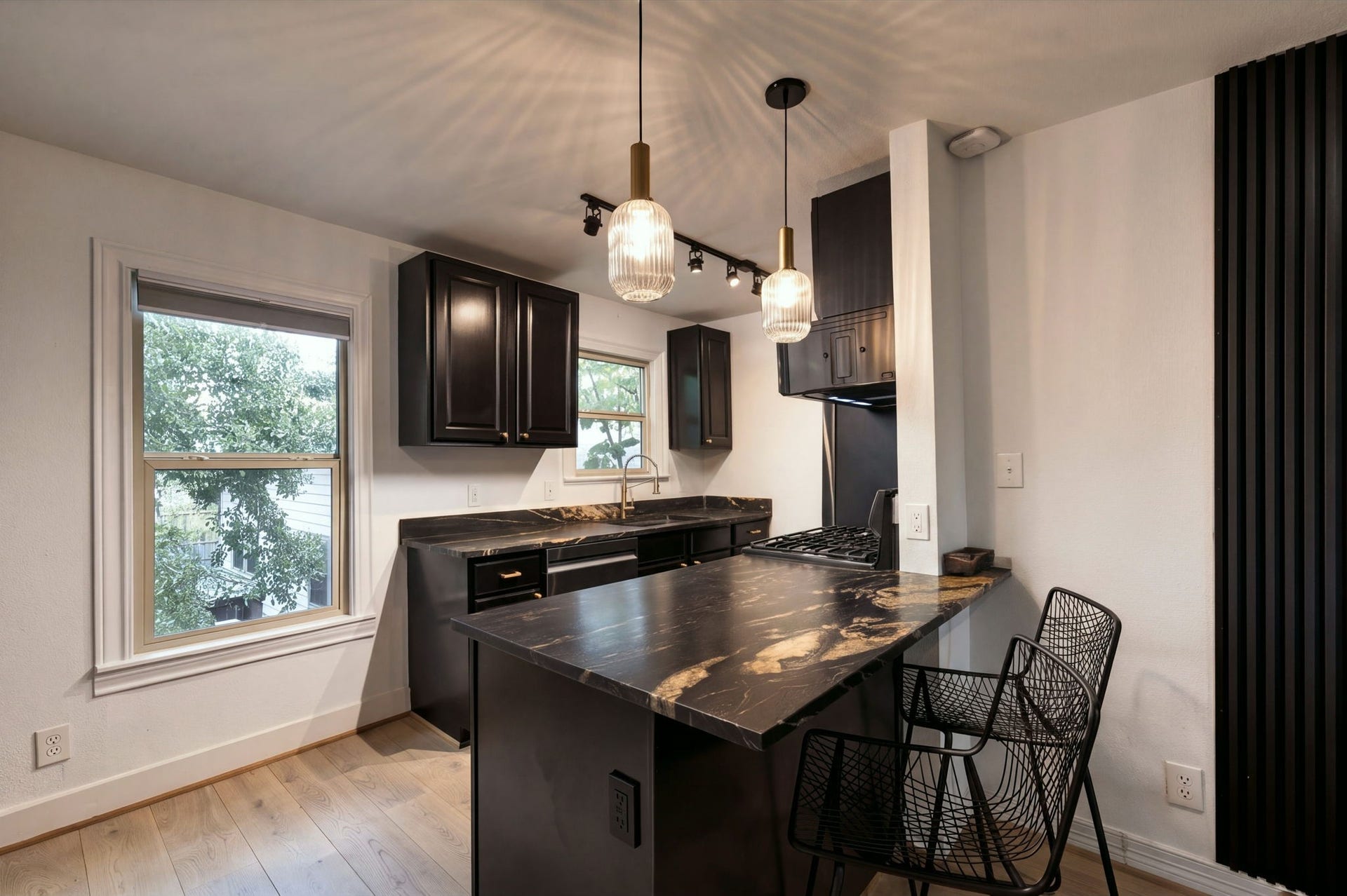 The breakfast bar with space for 2 barstools.
