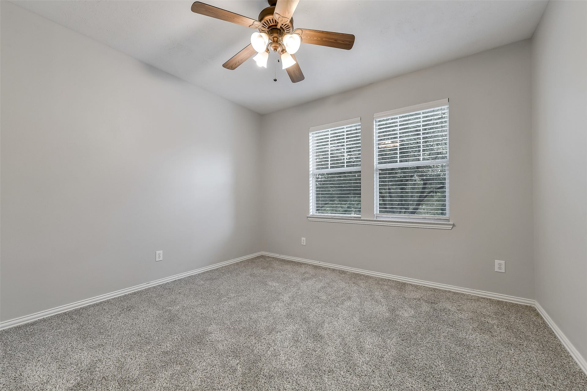 8407 Alyssa Gardens Lane, Humble, TX 77396 A spacious fifth bedroom on the second floor, perfect for guests, family, or a secondary home office