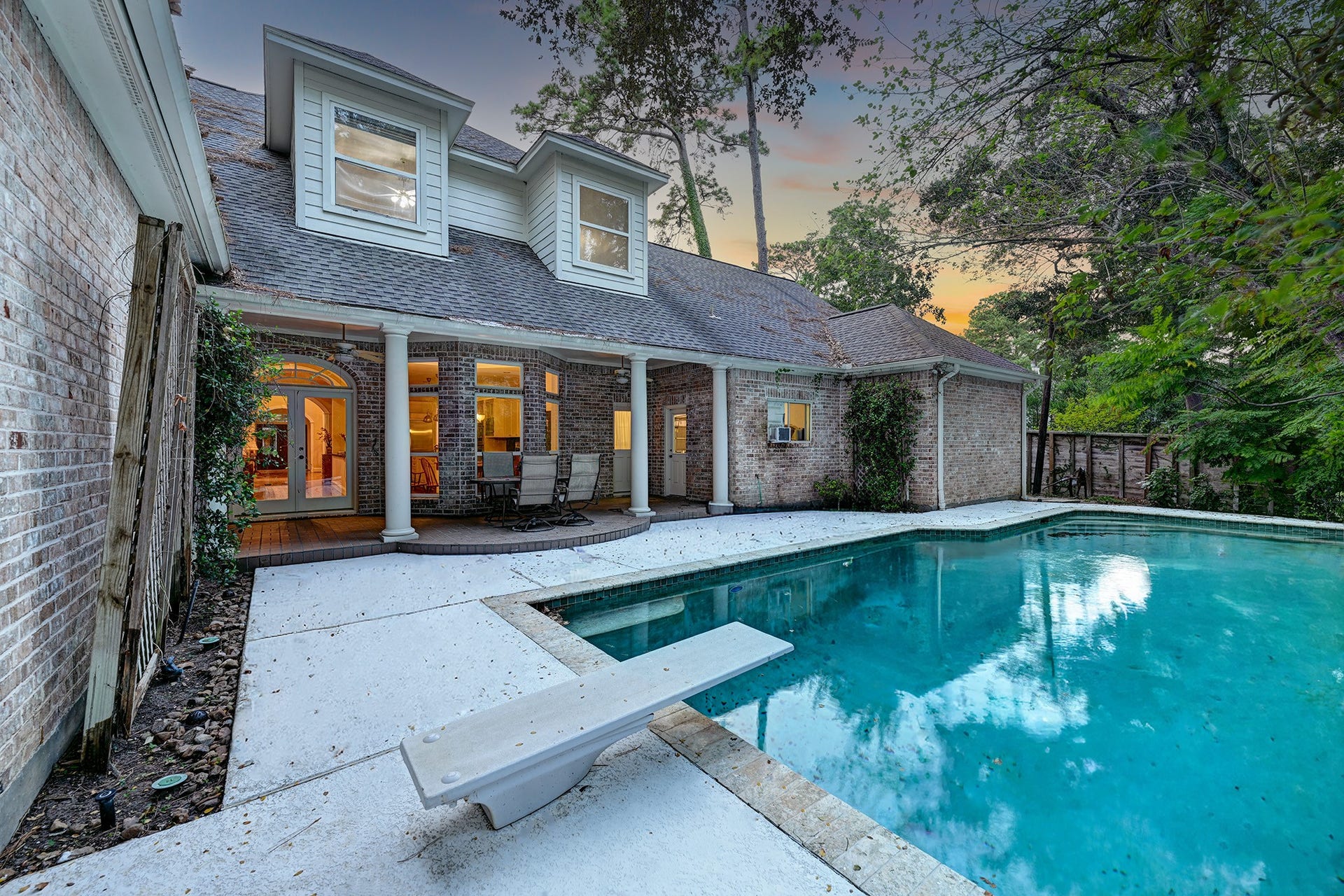 10 Sandalwood Drive, Houston, TX 77024 Multiple outdoor spaces provide space to entertain.