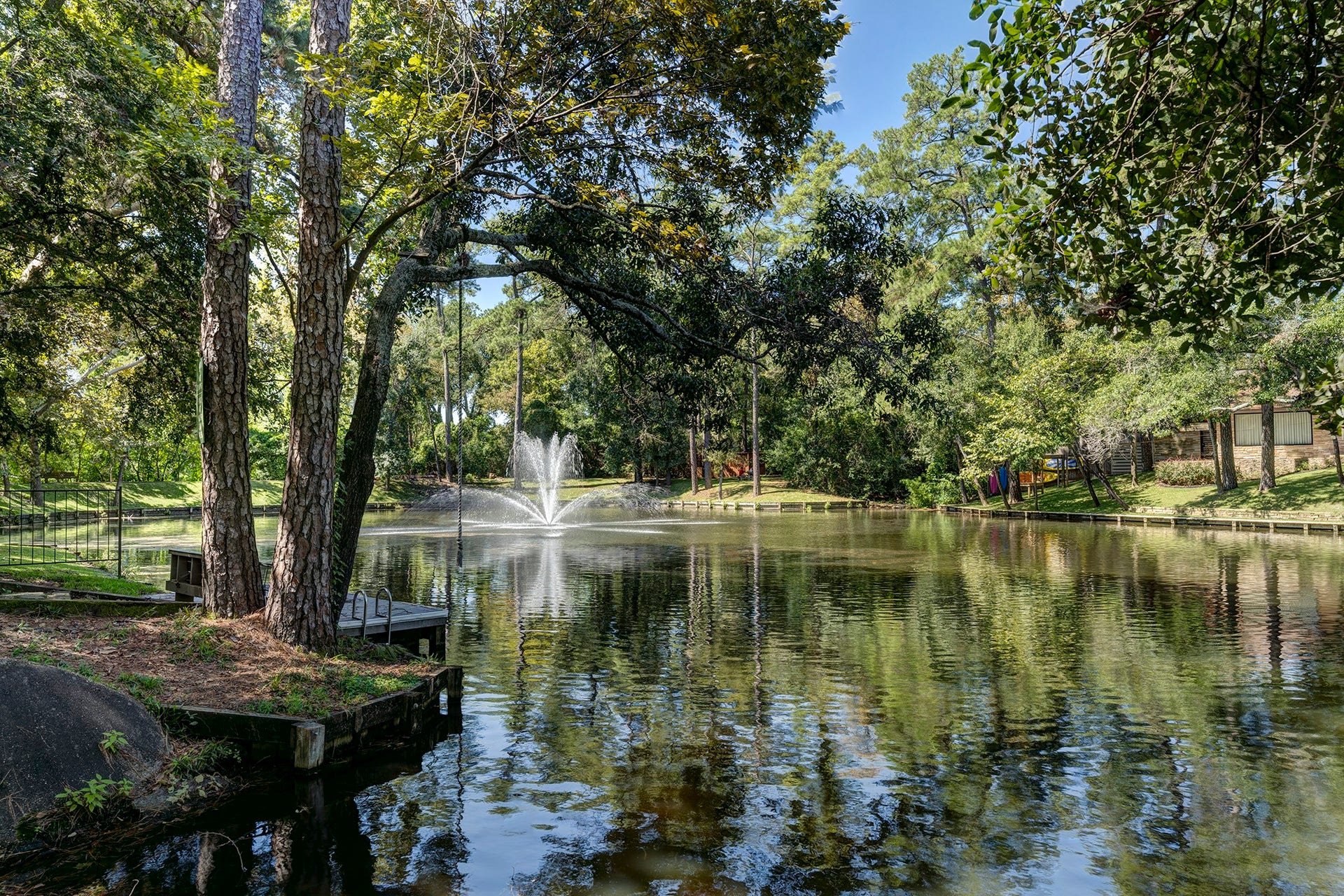10 Sandalwood Drive, Houston, TX 77024 Patti Lynn Lake has a terraced swim area and rope swing