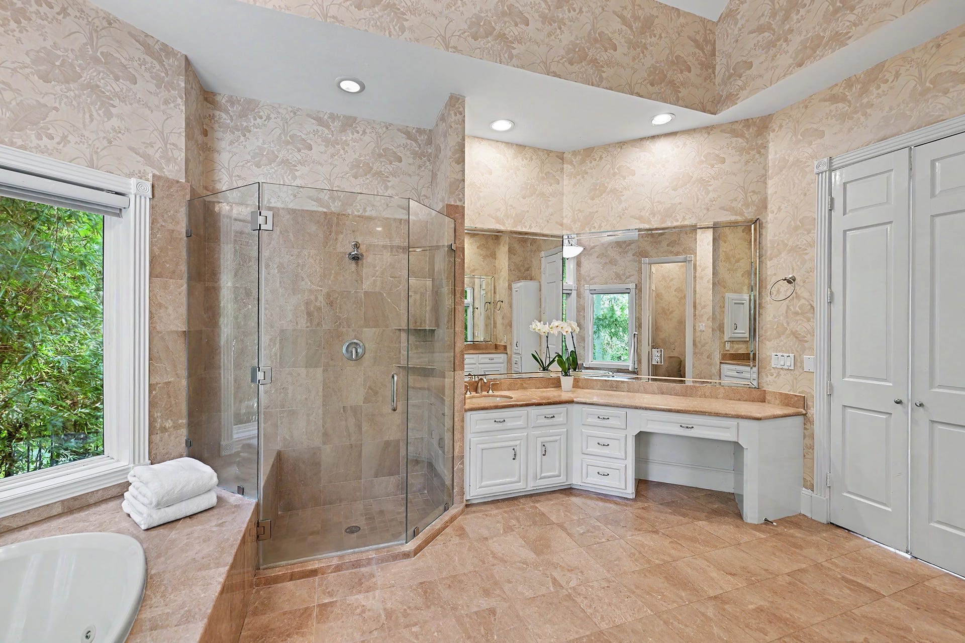 10 Sandalwood Drive, Houston, TX 77024 Primary bathroom has jetted tub and two dressing areas.
