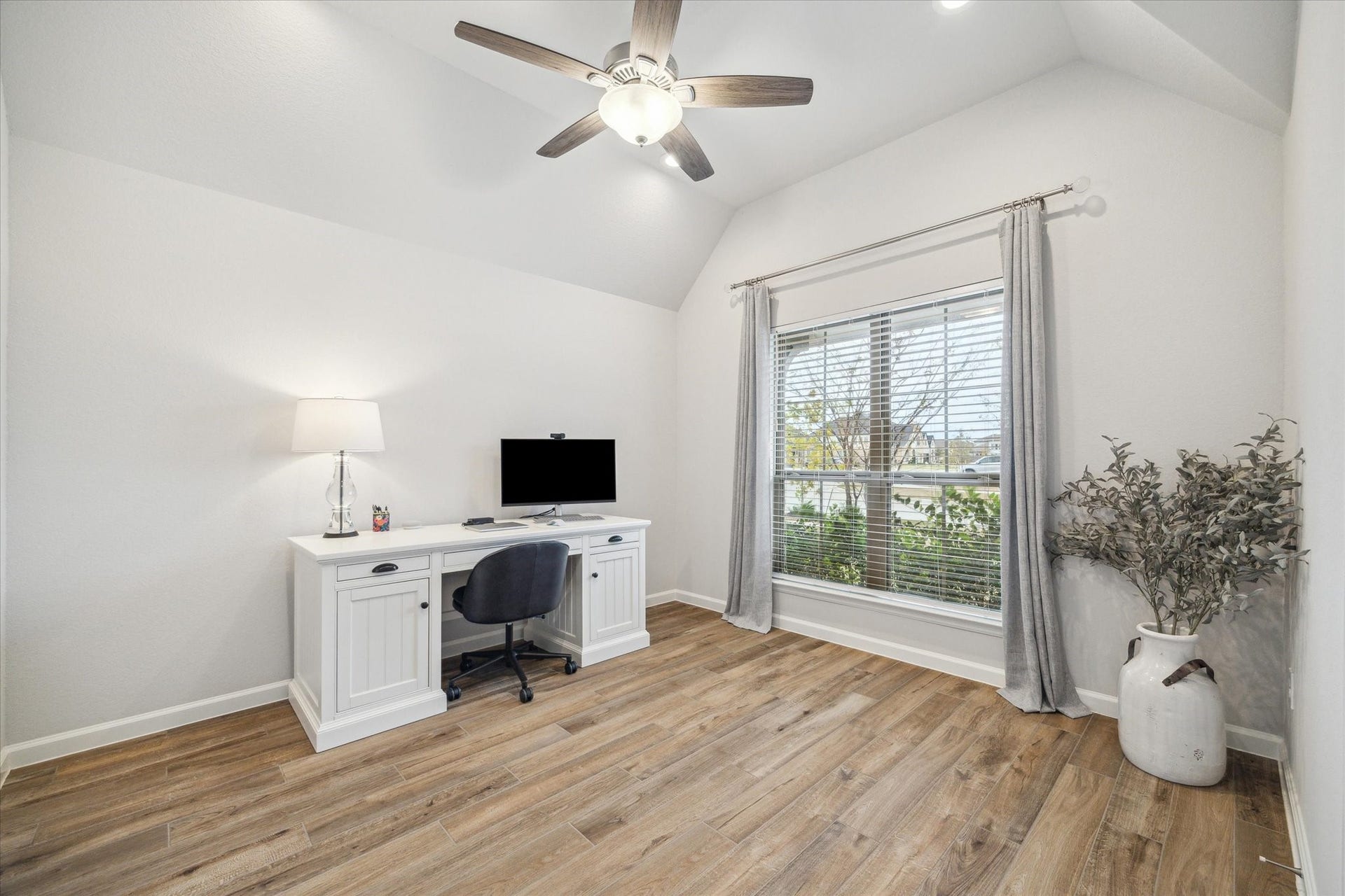 1523 Carson Field Lane, Richmond, TX 77469 The Study overlooks the front yard & features wood tile (found throughout the home), NO Carpet.