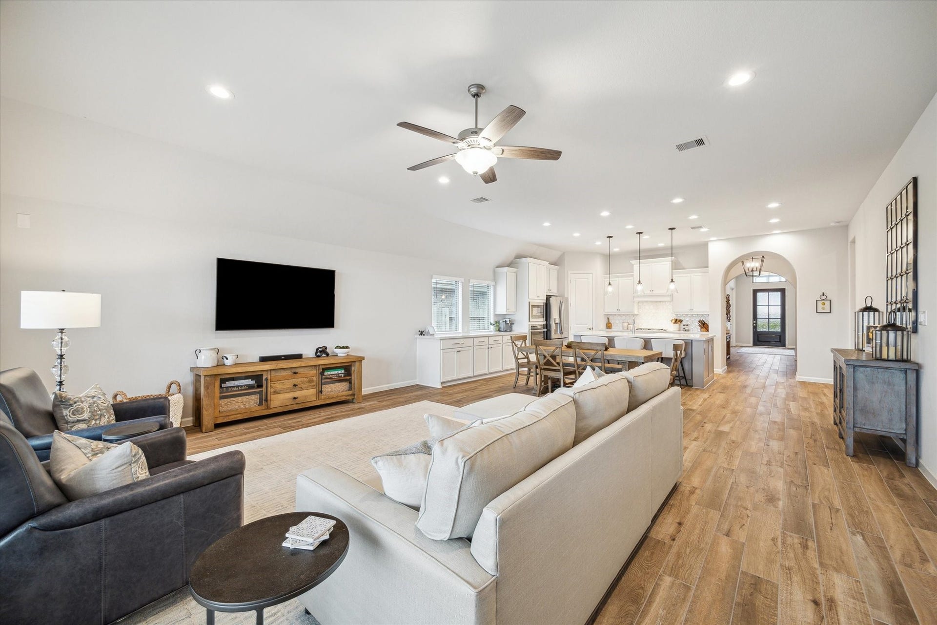 1523 Carson Field Lane, Richmond, TX 77469 This view shows the expansive openness of the home from the corner of the Living Room. Don't miss a second of action!