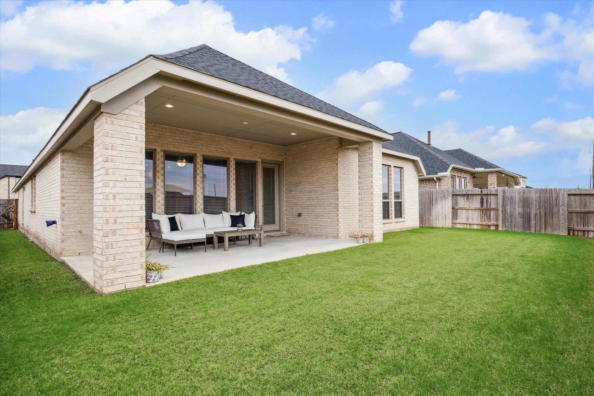 1523 Carson Field Lane, Richmond, TX 77469 While you enjoy the shade under the Covered Patio, there is plenty of space in the backyard for the kids or pets to play.