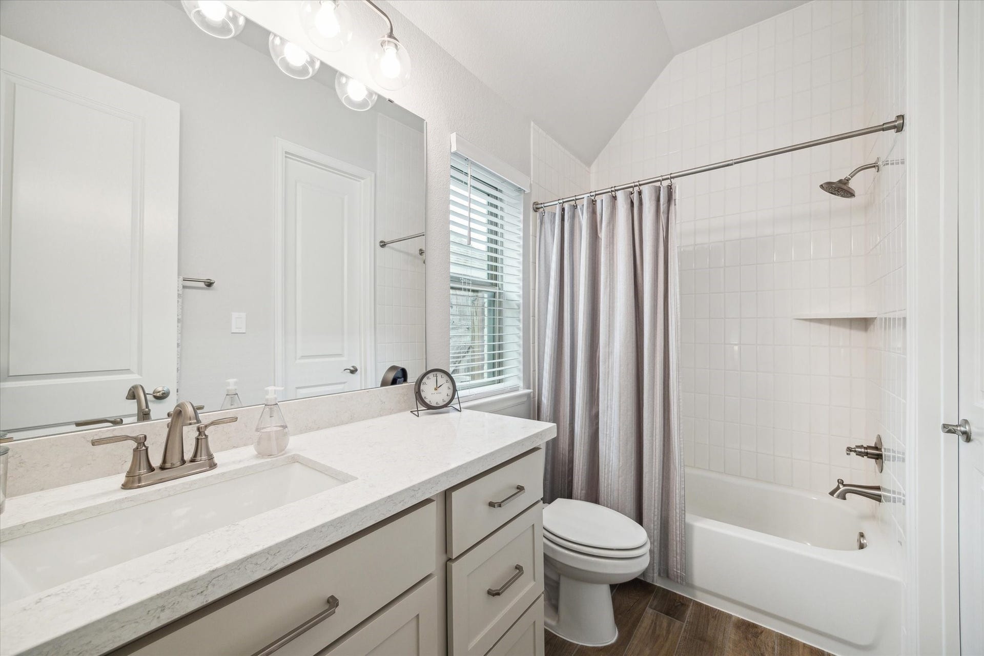 1523 Carson Field Lane, Richmond, TX 77469 En suite bathroom complete with quartz countertops & a walk in closet.