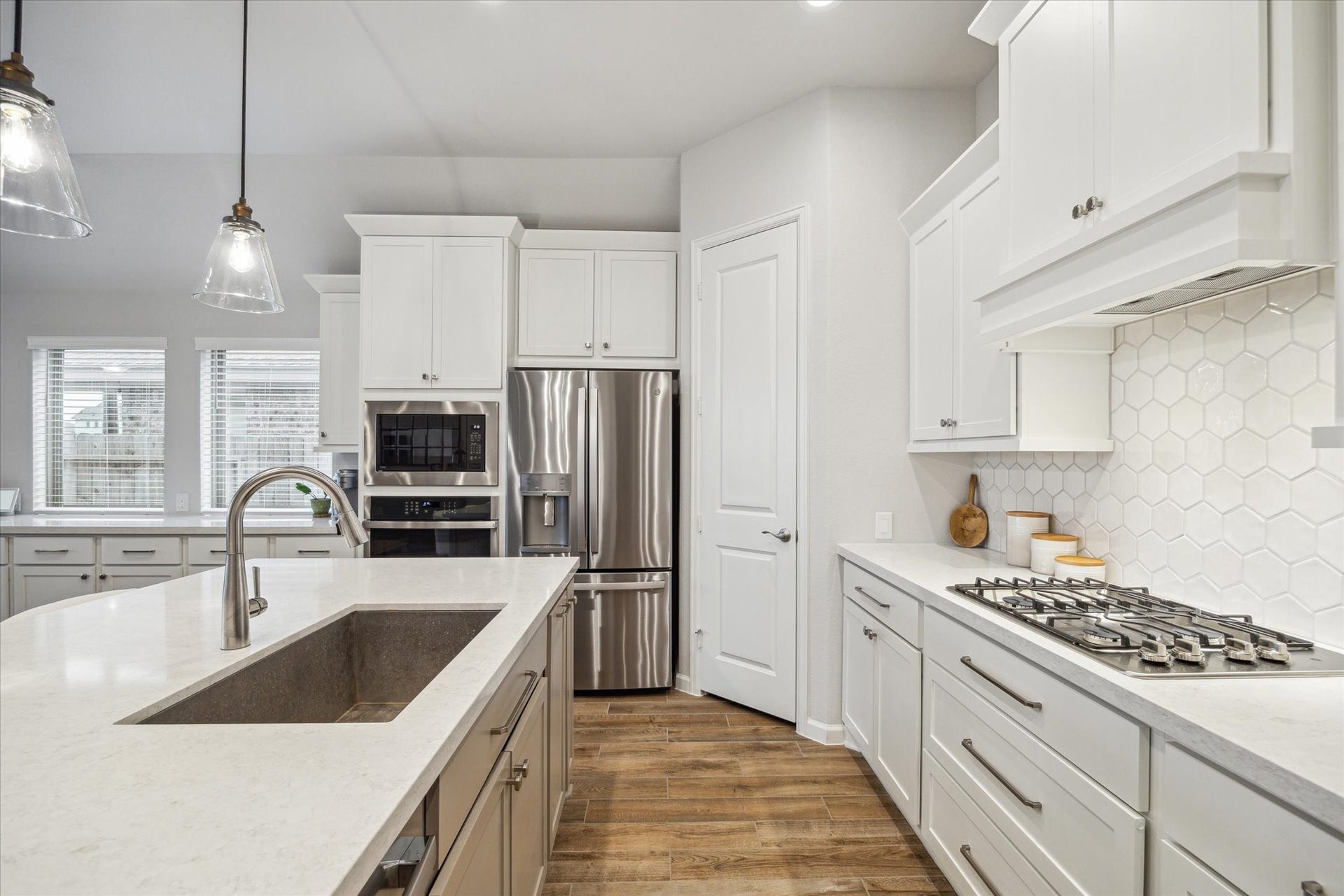1523 Carson Field Lane, Richmond, TX 77469 Modern aesthetics are found throughout the home. Pantry located straight ahead.