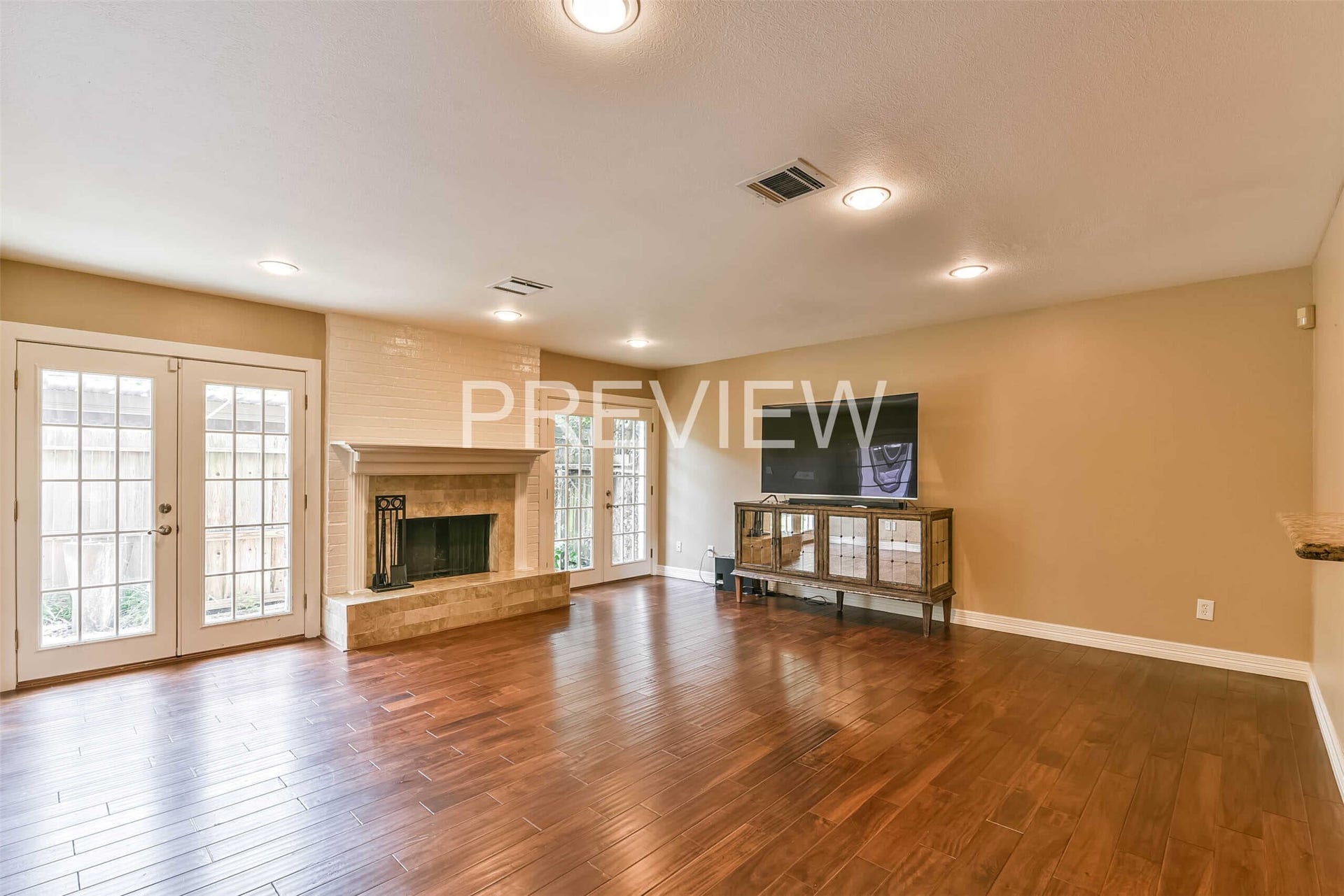 14122 Misty Meadow Lane, Houston, TX 77079 Living room w. cozy fireplace.