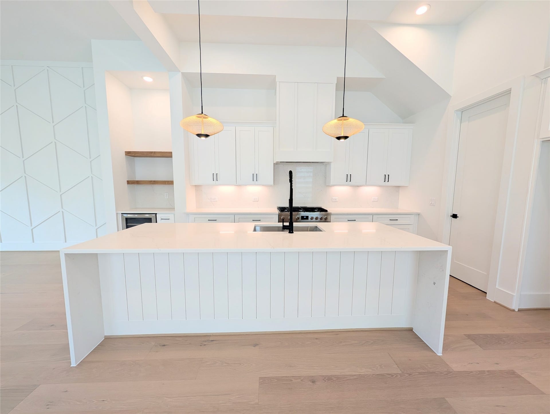 1322 Lawrence Street, Houston, TX 77008 Beautifully finished modern chef's kitchen with huge island and sleek dimmable lighting