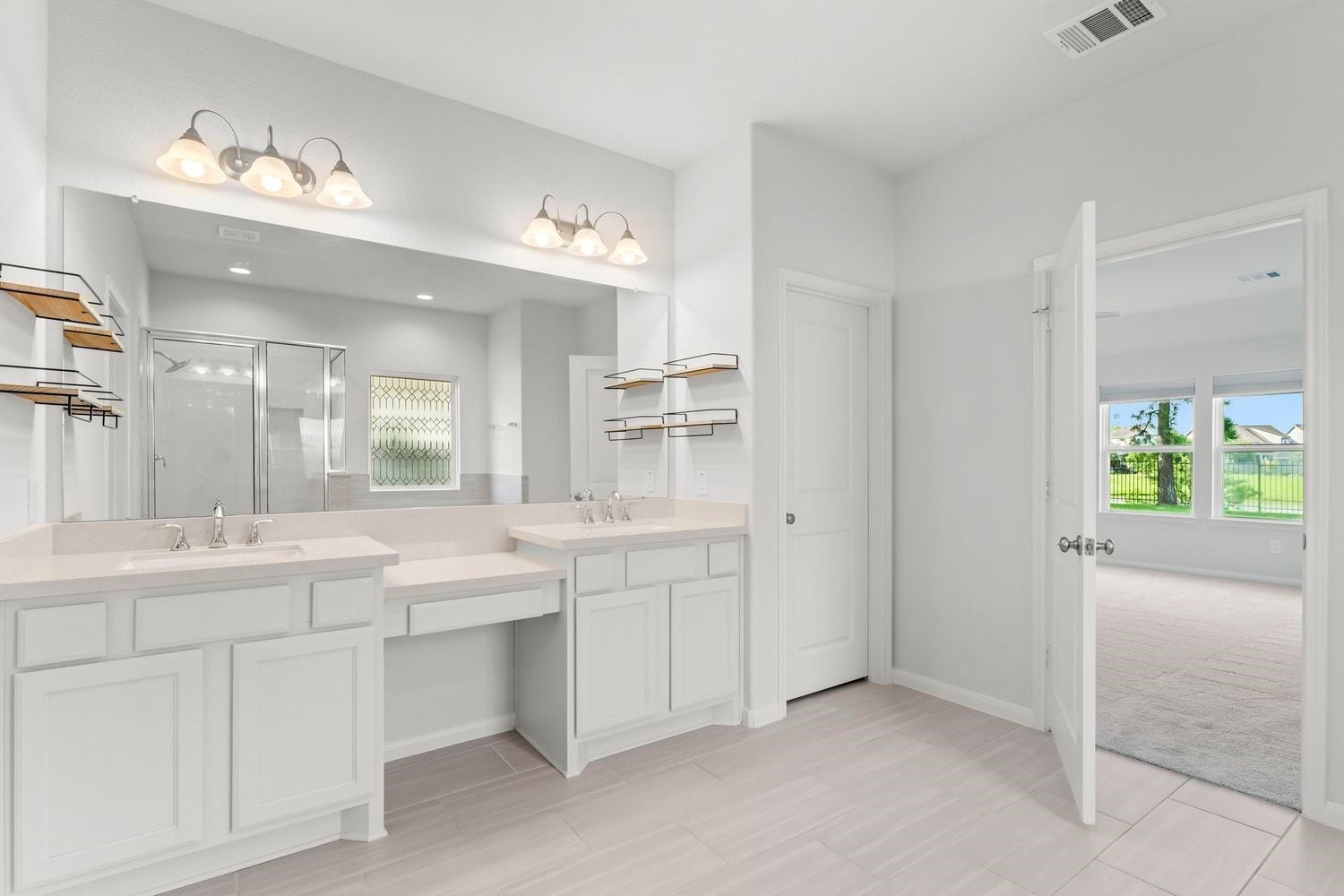 2125 Rope Maker Drive, Conroe, TX 77384 Large primary bathroom with double vanity, separate shower and bath tub.