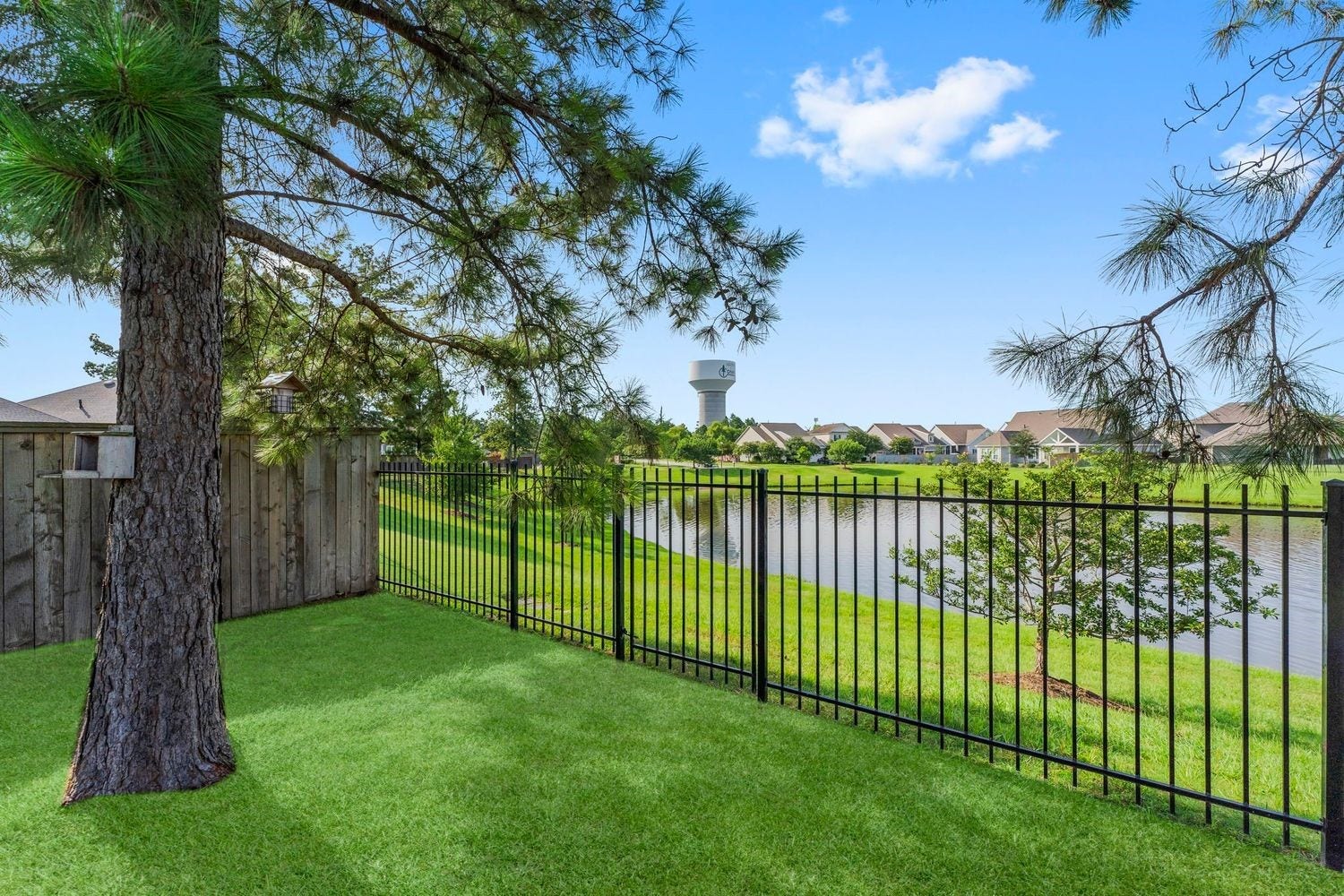 2125 Rope Maker Drive, Conroe, TX 77384 Beautiful pond side view.