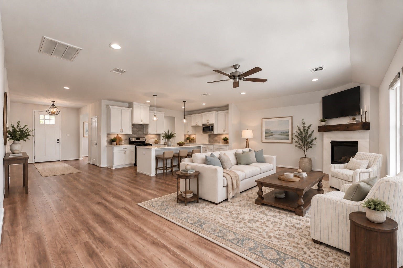 2125 Rope Maker Drive, Conroe, TX 77384 Virtually Staged. Oversized family room that flows to the kitchen, making for a functional and flexible floorplan.