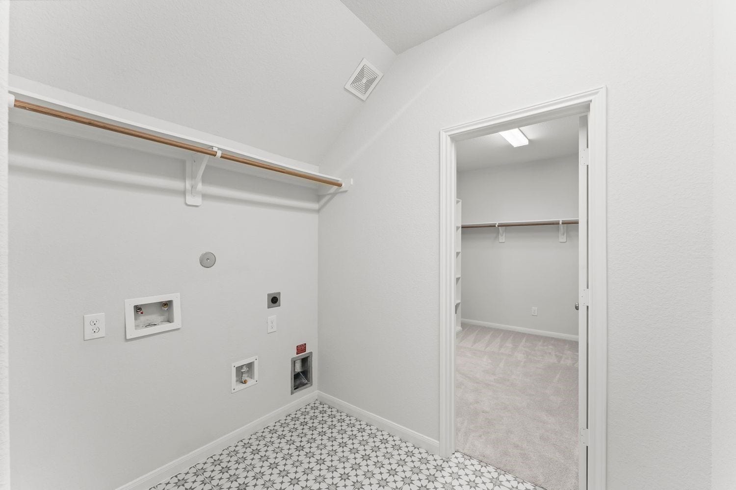 2125 Rope Maker Drive, Conroe, TX 77384 Large primary closet that is connected to the laundry room for your convenience.