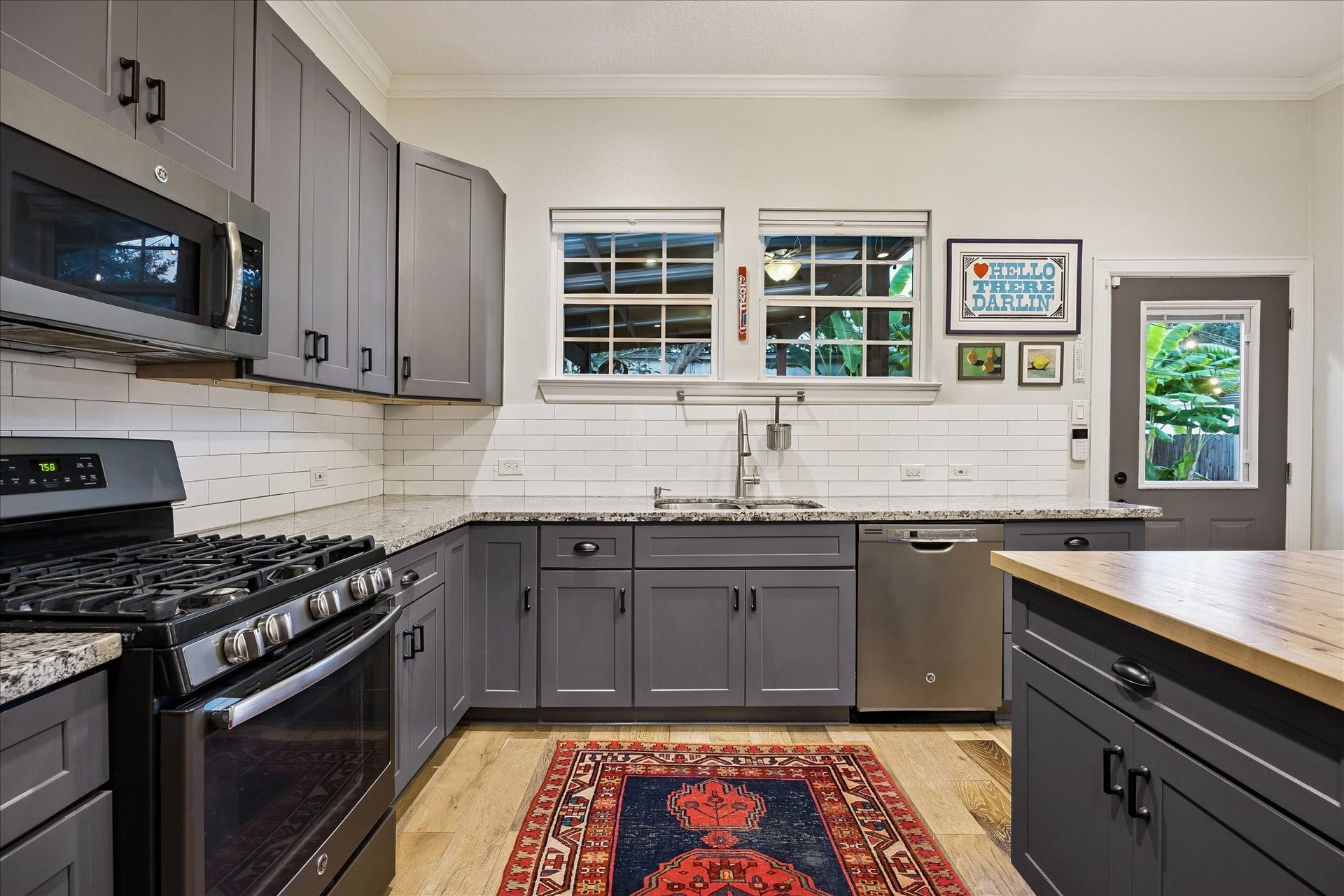 106 Alma Street, Houston, TX 77009 Look out to your backyard oasis from the kitchen sink windows