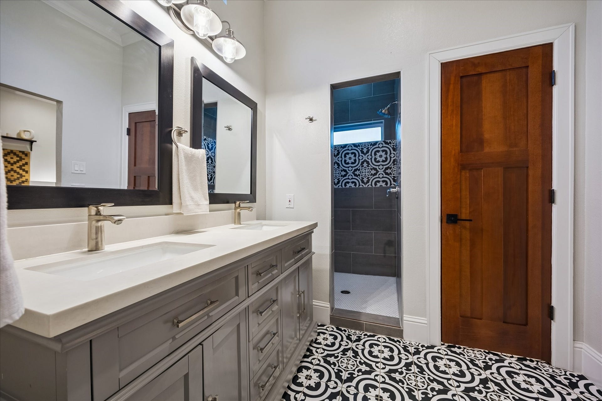106 Alma Street, Houston, TX 77009 Primary bathroom- such a fun tile!