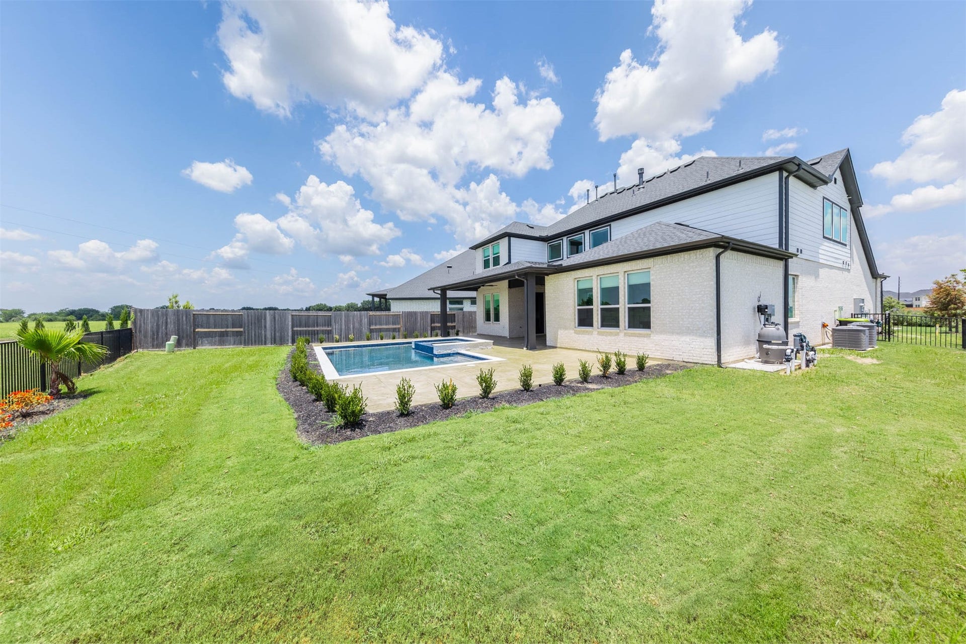 Expansive backyard showcasing the home's exceptional setting.