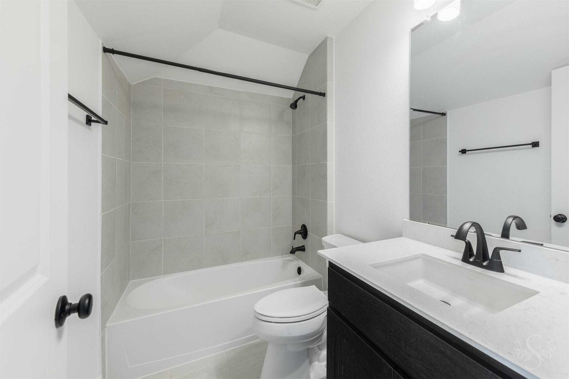 Well-appointed secondary bathroom.