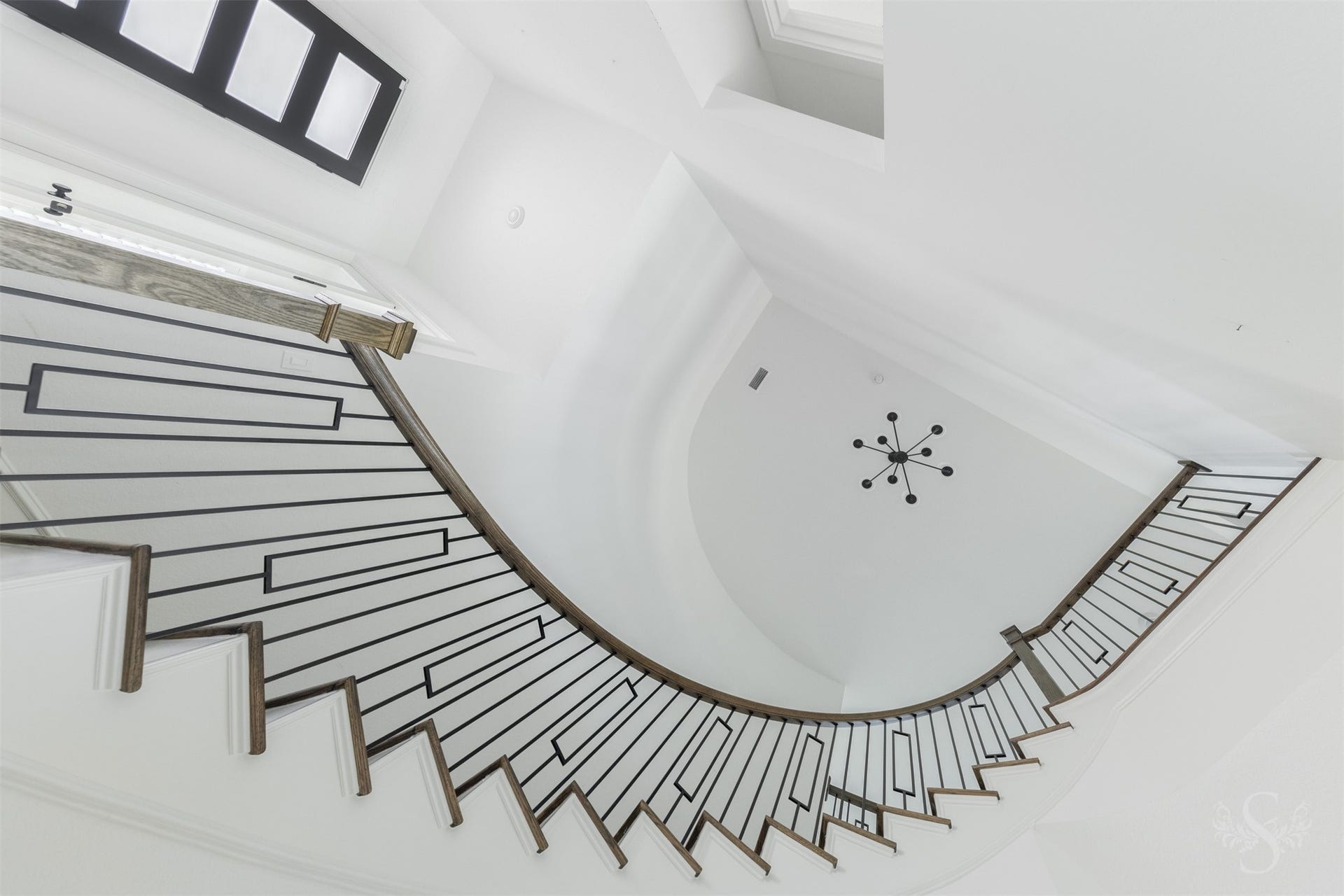 Modern staircase adds architectural character to the home.