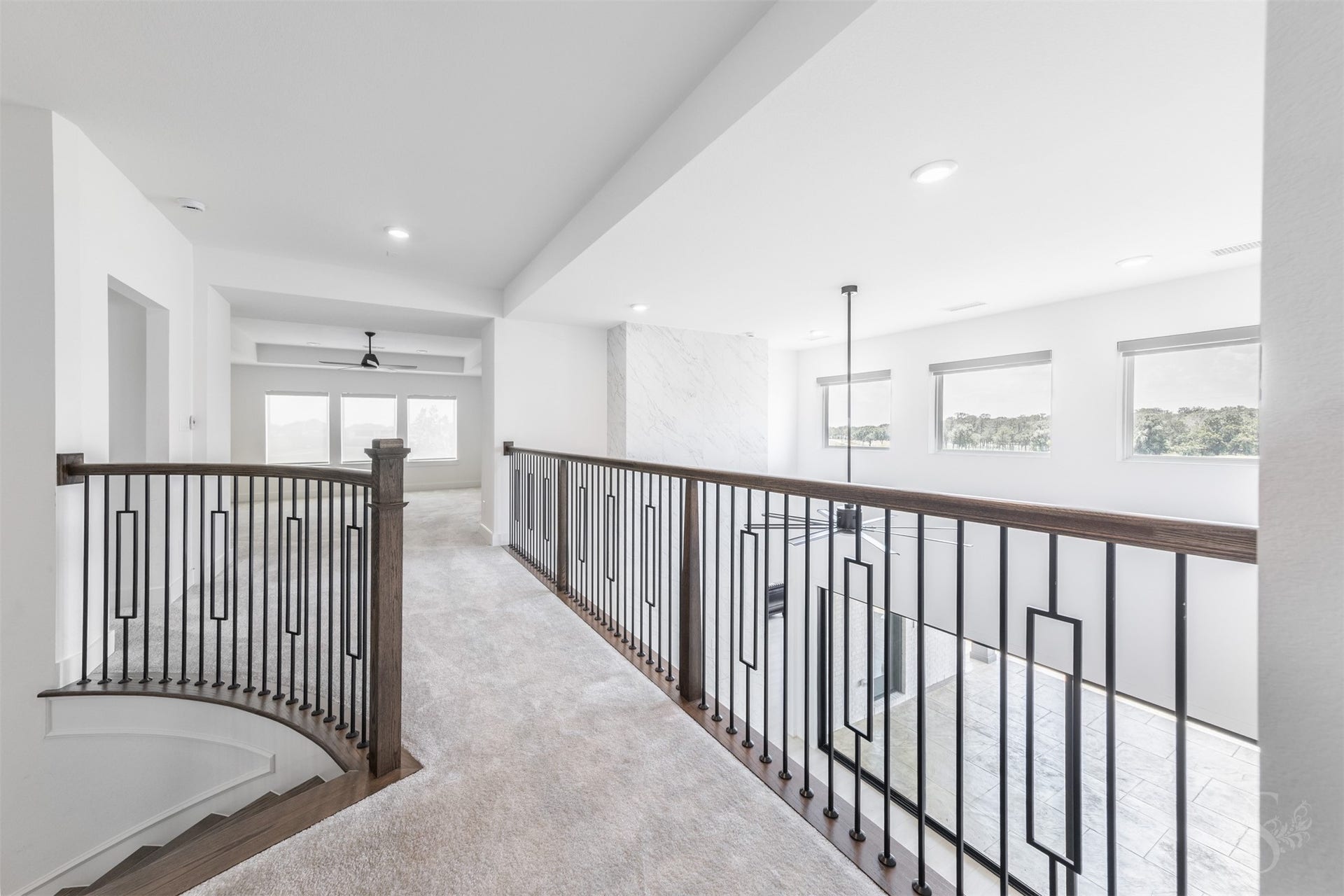 Upstairs overlook highlighting the home's open design