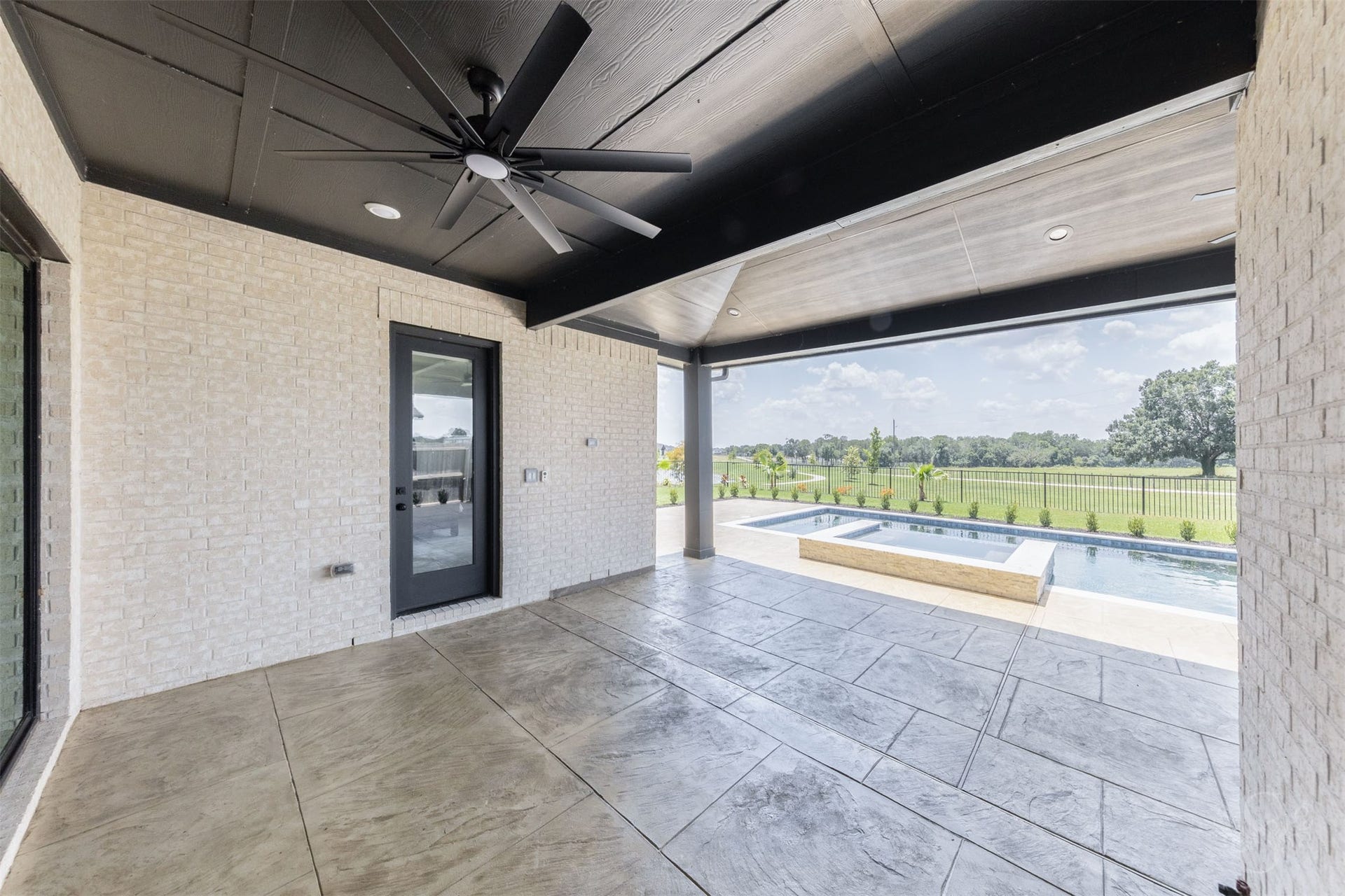 Covered patio designed for year-round outdoor living.