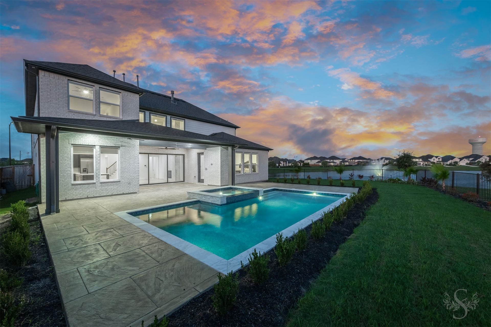 Spectacular evening setting overlooking the pool and lake.