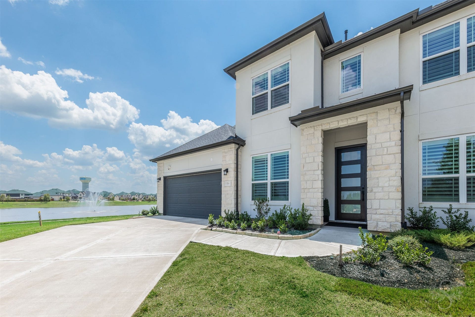 Beautiful contemporary exterior and 3-car garage.