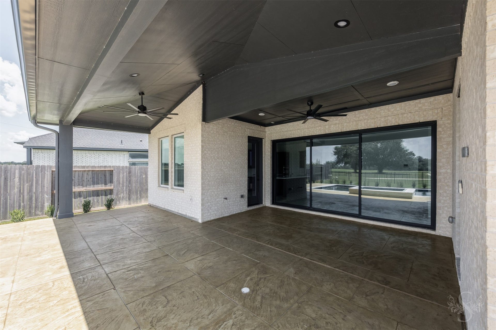 Covered patio with seamless access to the main living area.