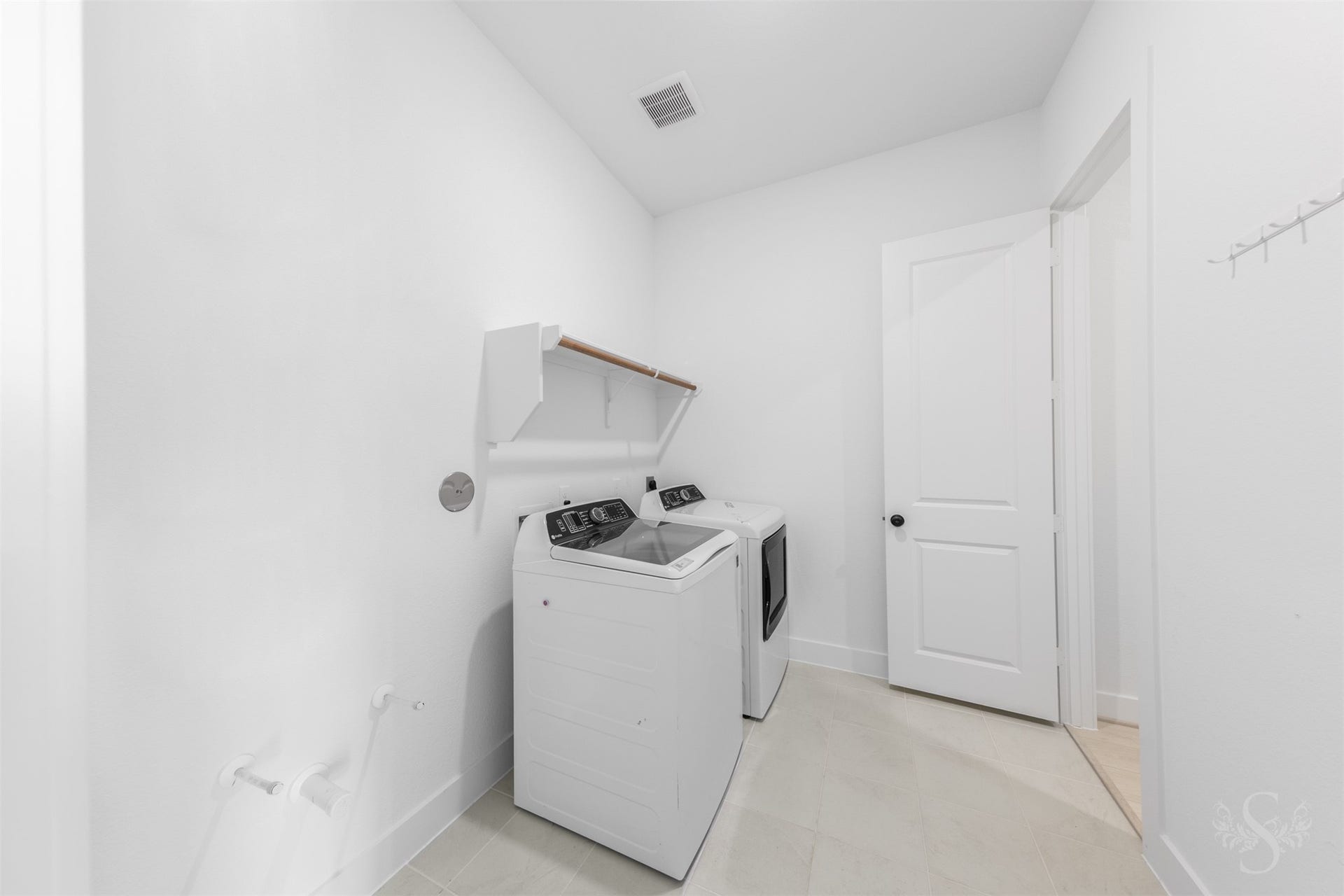 Convenient in-home utility and laundry room.
